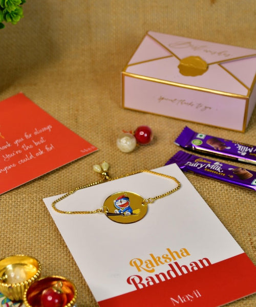 Sowpeace Exquisite Doraemon Rakhi Pack of 1 with Roli Chawal Thali, two Chocolates, and Greeting card combo for Raksha Bandhan and Gifting