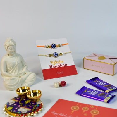 Sowpeace Exquisite Evil Eye Rakhi Pack of 1 with Roli Chawal Thali, Chocolates, Buddha and Greeting card combo for Raksha Bandhan and Gifting