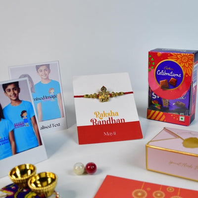 Sowpeace Exquisite Golden Ganesha Rakhi Pack of 1 with Roli Chawal Thali, Chocolates, Poloroids and Greeting card combo for Raksha Bandhan and Gifting