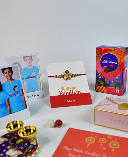 Sowpeace Exquisite Golden Ganesha Rakhi Pack of 1 with Roli Chawal Thali, Chocolates, Poloroids and Greeting card combo for Raksha Bandhan and Gifting