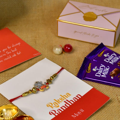 Sowpeace Exquisite Green Ganesha Rakhi Pack of 1 with Roli Chawal Thali, Chocolates, and Greeting card combo for Raksha Bandhan and Gifting