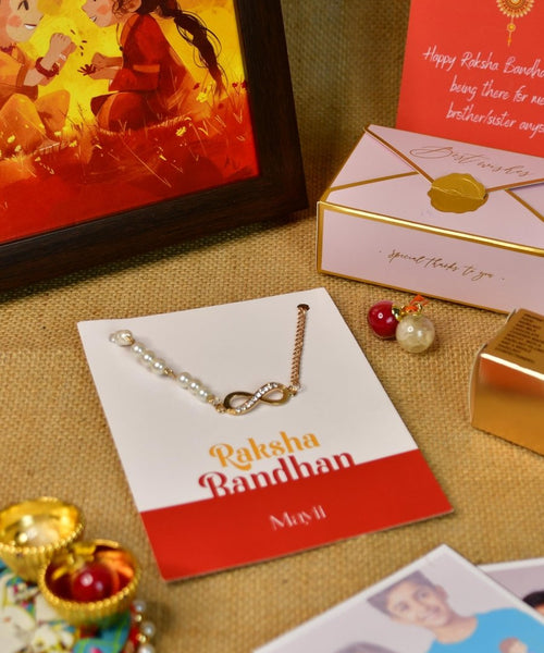 Sowpeace Exquisite Infinite Rakhi Pack of 1 with Roli Chawal Thali, Chocolates, Photo Frame, Poloroids and Greeting card combo for Raksha Bandhan and Gifting
