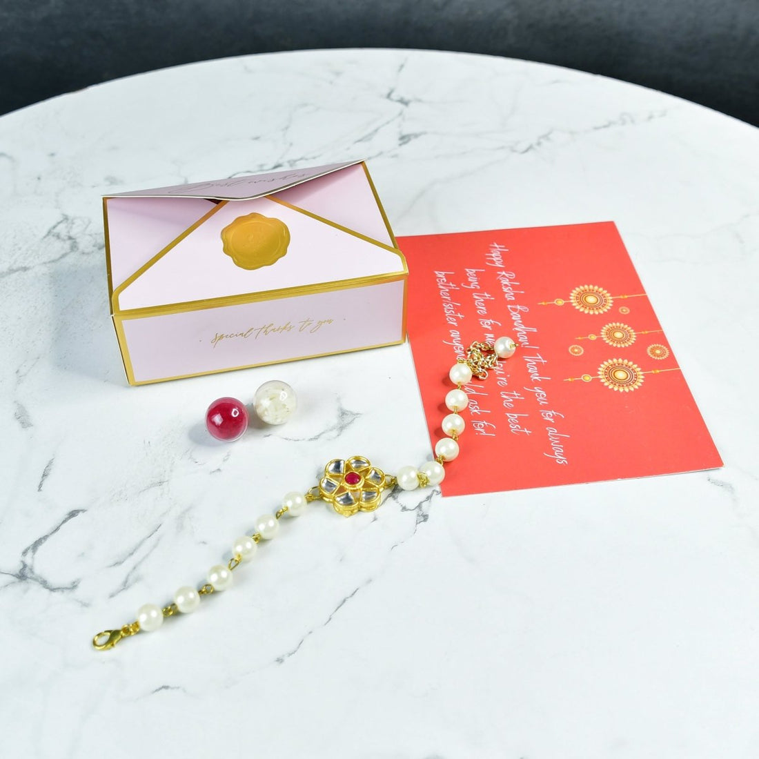 Sowpeace Exquisite Pearl Rakhi Pack of 1 with Roli Chawal and Greeting card combo for Raksha Bandhan and Gifting - Sowpeace - 