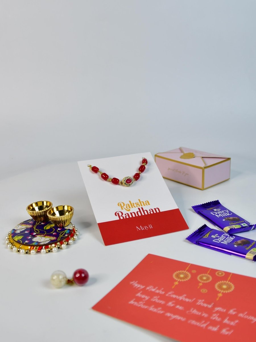 Sowpeace Exquisite Red Beads Rakhi Pack of 1 with Roli Chawal Thali, Chocolates, and Greeting card combo for Raksha Bandhan and Gifting - Rakhi - Sowpeace - Default Title - RAK - REDBD - HND - P3 - Sowpeace
