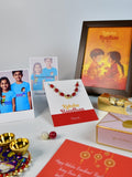 Sowpeace Exquisite Red Beads Rakhi Pack of 1 with Roli Chawal Thali, Chocolates, Photo Frame, Poloroids and Greeting card combo for Raksha Bandhan and Gifting - Rakhi - Sowpeace - Default Title - RAK - REDBD - HND - P7 - Sowpeace