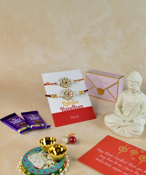 Sowpeace Exquisite Red Centre Flower Rakhi Pack of 1 with Roli Chawal Thali, Chocolates, Buddha and Greeting card combo for Raksha Bandhan and Gifting
