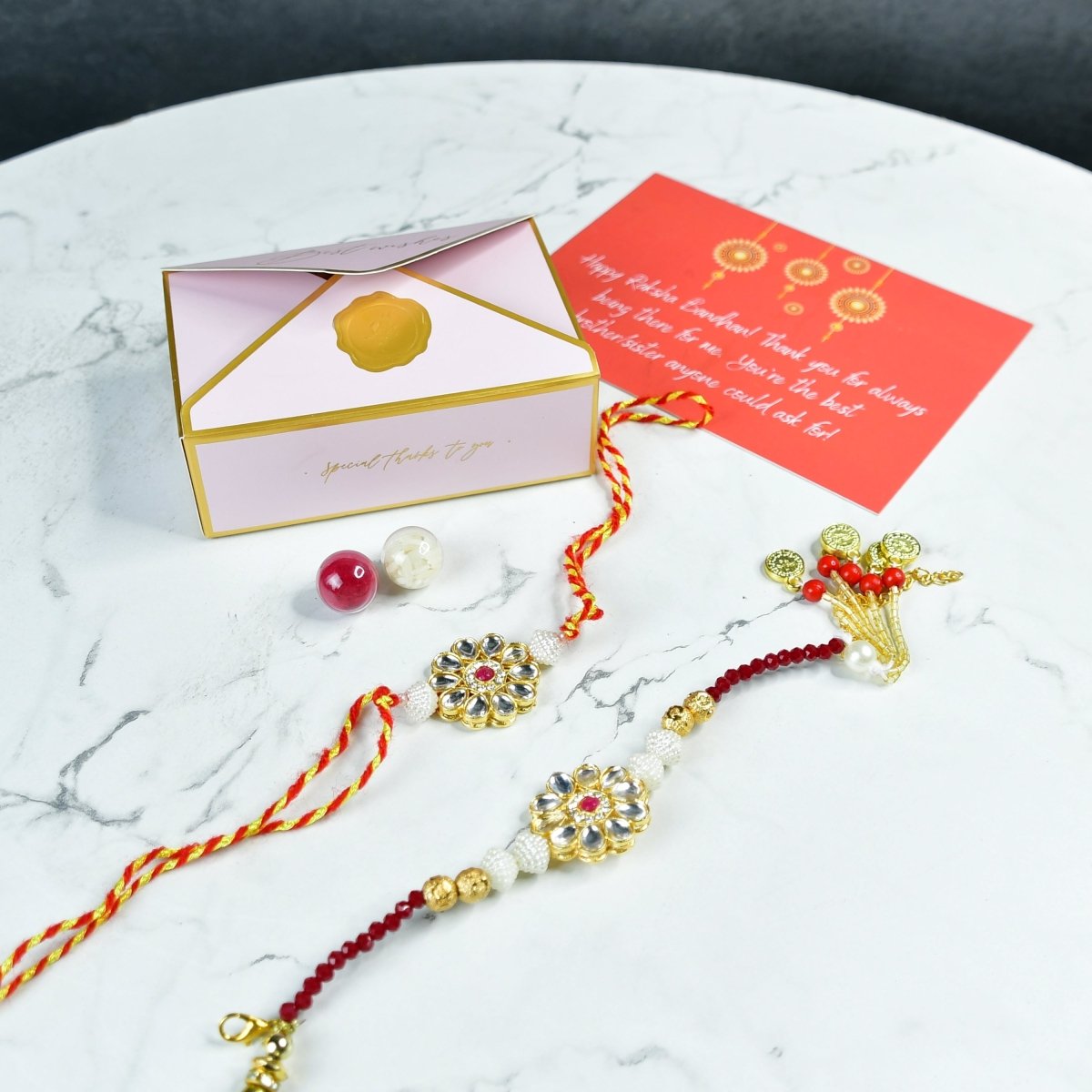 Sowpeace Exquisite Red Centre Flower Rakhi Pack of 2 with Roli Chawal and Greeting card combo for Raksha Bandhan and Gifting - Sowpeace - 
