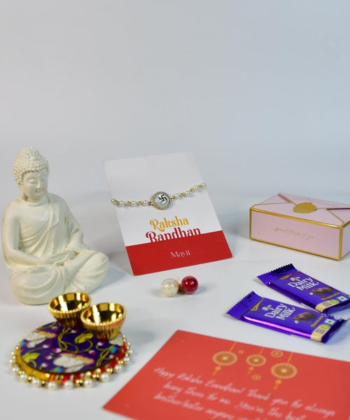 Sowpeace Exquisite Swastik Rakhi Pack of 1 with Roli Chawal Thali, Chocolates, Buddha and Greeting card combo for Raksha Bandhan and Gifting
