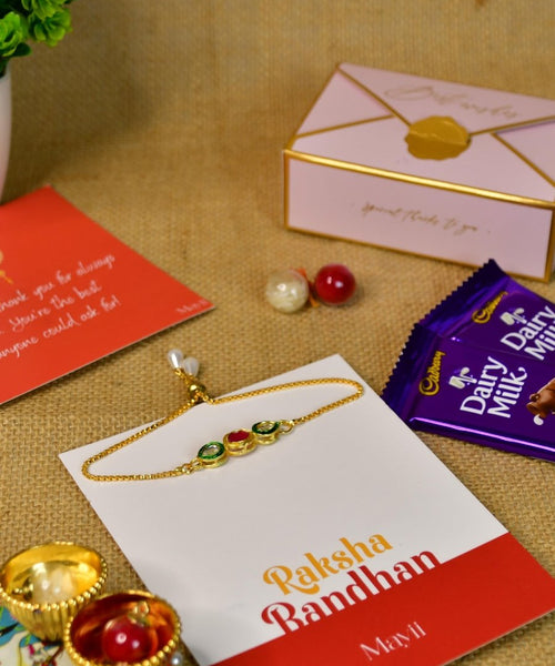 Sowpeace Exquisite Tri Red Green Rakhi Pack of 1 with Roli Chawal Thali, Chocolates, and Greeting card combo for Raksha Bandhan and Gifting